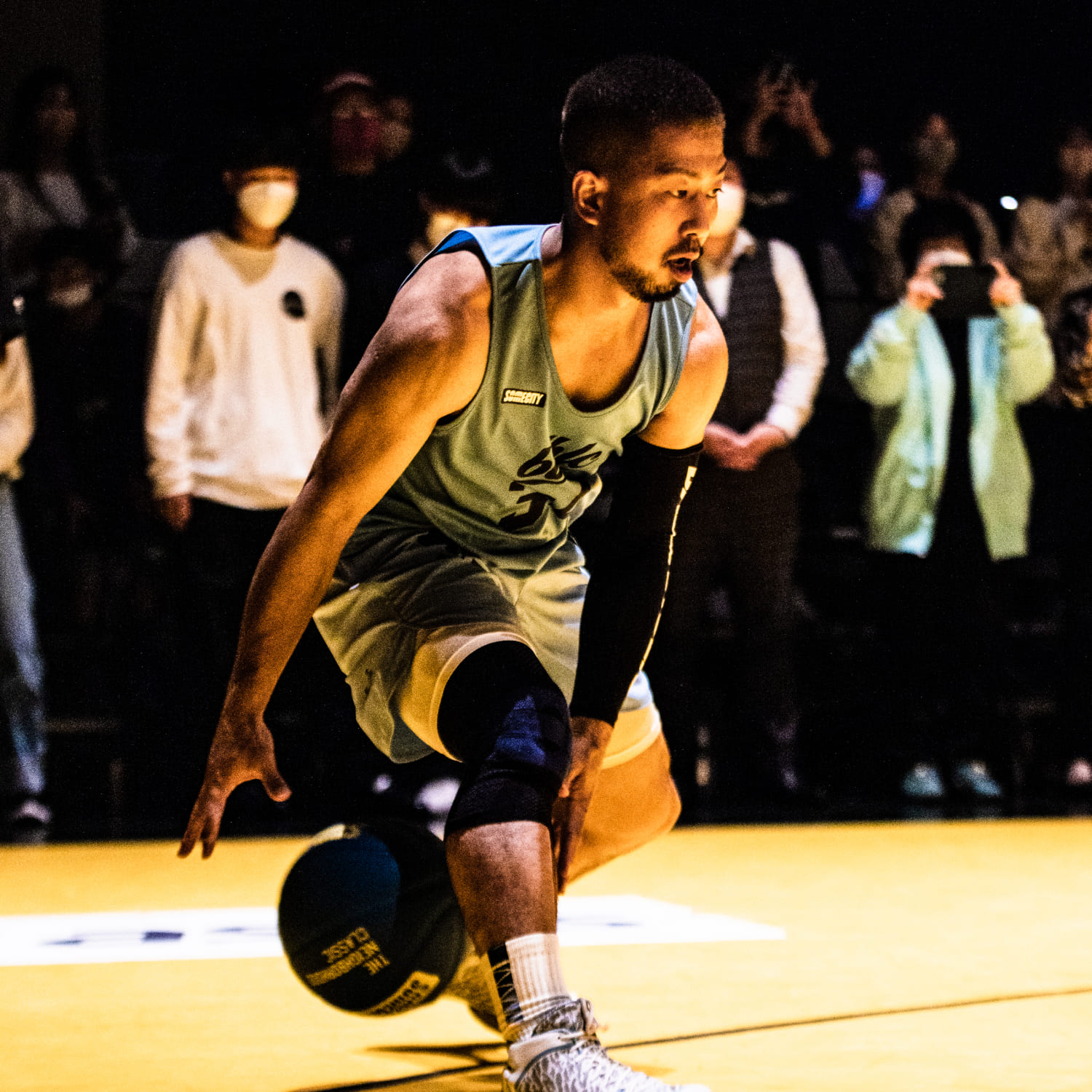 KKのプロフィール写真:試合中にドリブルをしている様子の写真